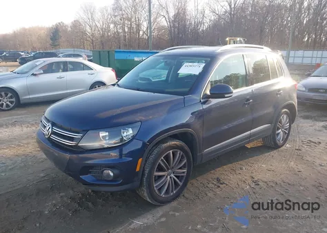 2014 Volkswagen Tiguan Sel z USA, uszkodzony, nr VIN WVGAV3AX7EW626003